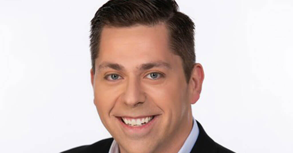 Joe Malmuth smiling at camera